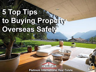 What are some tips for buying property in Belize?